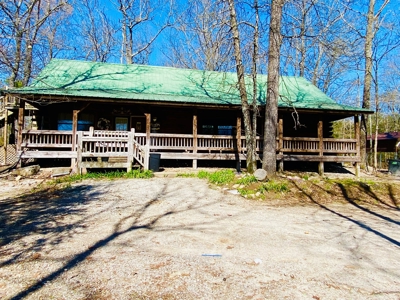 Land With Multiple Cabins For Sale In North Central Arkansas - image 2
