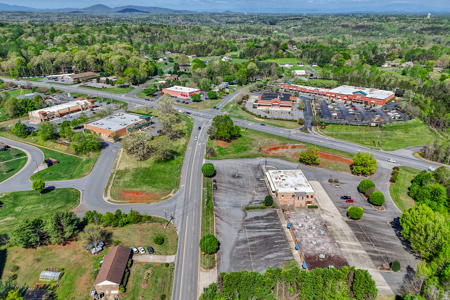 19.75 Acres of Commercial Land and Buildings - image 10