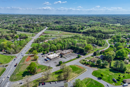 19.75 Acres of Commercial Land and Buildings - image 2