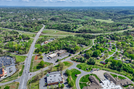 19.75 Acres of Commercial Land and Buildings - image 4