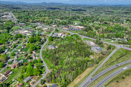 19.75 Acres of Commercial Land and Buildings - image 12