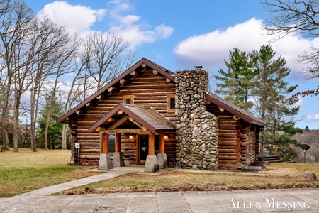 Custom Log Home on 10+ Acres with private Muskegon river frontage - image 1
