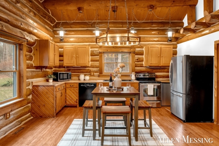 Custom Log Home on 10+ Acres with private Muskegon river frontage - image 5