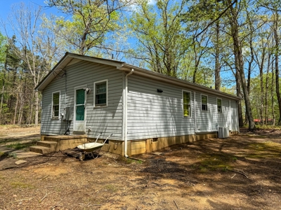 Country Living with Investment Potential: 7.45 Acres in Keeling - image 13