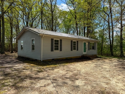 Country Living with Investment Potential: 7.45 Acres in Keeling - image 1