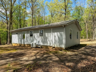 Country Living with Investment Potential: 7.45 Acres in Keeling - image 12