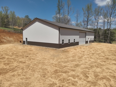 Charming Country Barndominium with Spacious Shop Near Linden, TN - image 7
