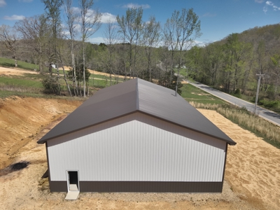 Charming Country Barndominium with Spacious Shop Near Linden, TN - image 6