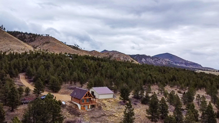 Log Cabin in the Little Rocky Mountains near Landusky Montana - image 1