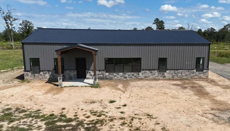 Arkansas Retreat – 100 Acres with New Home, Shop & Private Lake - image 1