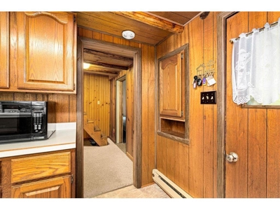 Cabin w/ 60 Feet of Shoreline on Sand Lake For Sale - image 11