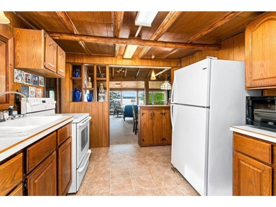 Cabin w/ 60 Feet of Shoreline on Sand Lake For Sale - image 9