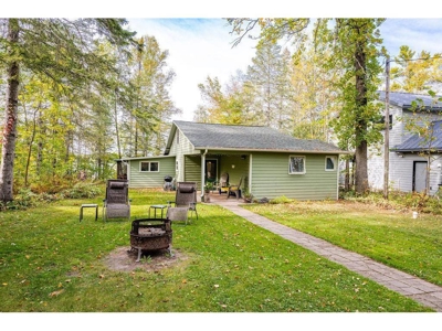 Cabin w/ 60 Feet of Shoreline on Sand Lake For Sale - image 1