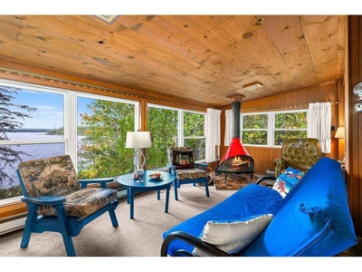 Cabin w/ 60 Feet of Shoreline on Sand Lake For Sale - image 5