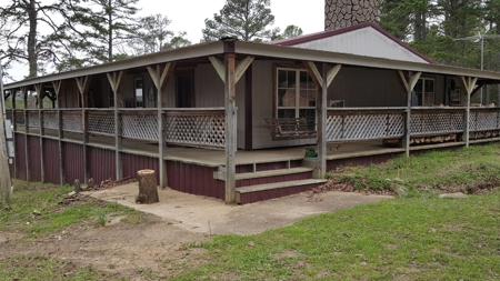 Cabin on Acreage for Sale in Moyers, Oklahoma - image 1