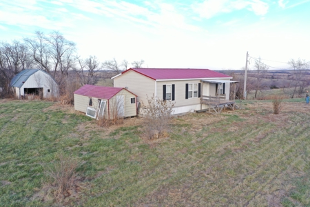 160 Acres with Home & 5 Acre Lake - image 25