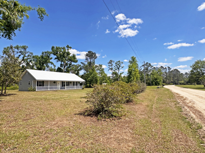 Lake Home with Attached Garage For Sale in Jennings, FL - image 36
