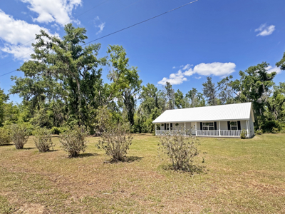Lake Home with Attached Garage For Sale in Jennings, FL - image 37