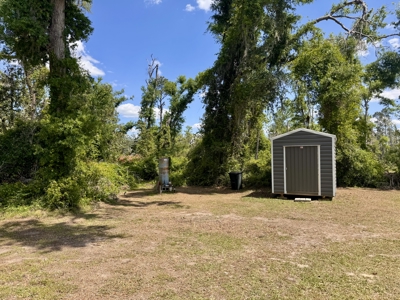 Lake Home with Attached Garage For Sale in Jennings, FL - image 46