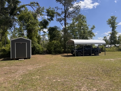 Lake Home with Attached Garage For Sale in Jennings, FL - image 47