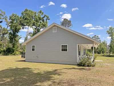 Lake Home with Attached Garage For Sale in Jennings, FL - image 34