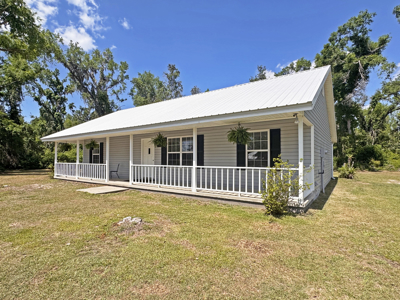 Lake Home with Attached Garage For Sale in Jennings, FL - image 40