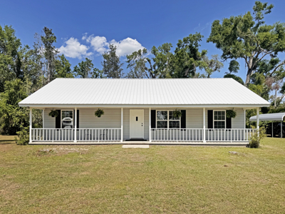 Lake Home with Attached Garage For Sale in Jennings, FL - image 39