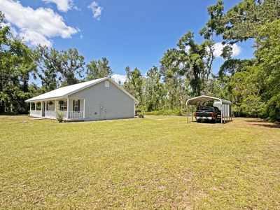 Lake Home with Attached Garage For Sale in Jennings, FL - image 33