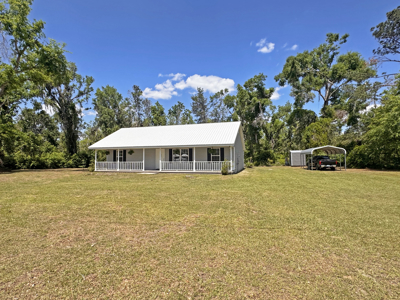 Lake Home with Attached Garage For Sale in Jennings, FL - image 38