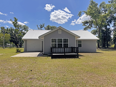 Lake Home with Attached Garage For Sale in Jennings, FL - image 30