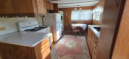 Lakeside Fixer-Upper with Deck, Views & Great Location! - image 1