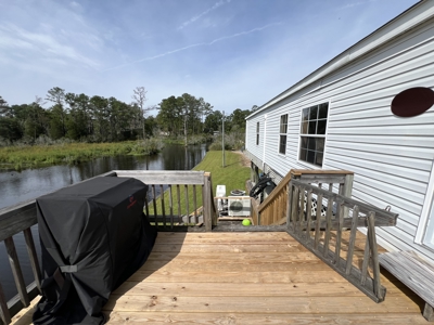 Waterfront Getaway with Views, Boathouse & Ramp Access - image 11