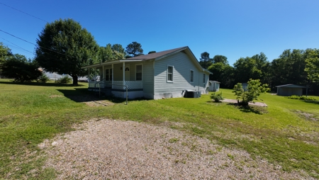 Colonial Cottage Home Hidden in Atlanta Tx - image 1