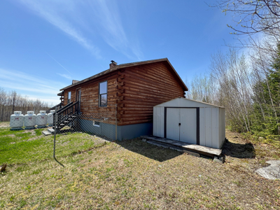 Off-Grid Log Cabin Retreat on 65± Acres - image 4