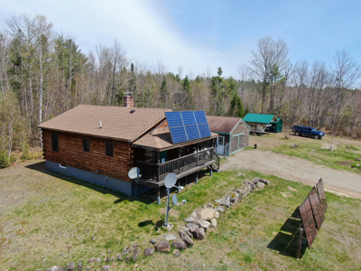 Off-Grid Log Cabin Retreat on 65± Acres - image 2