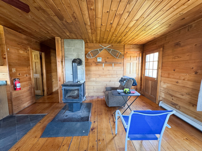 Off-Grid Log Cabin Retreat on 65± Acres - image 13
