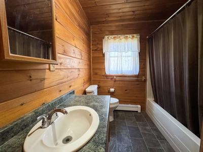 Off-Grid Log Cabin Retreat on 65± Acres - image 15