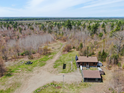 Off-Grid Log Cabin Retreat on 65± Acres - image 6