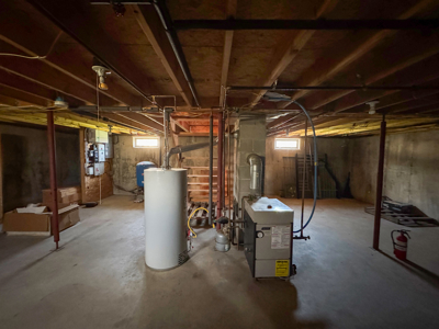 Off-Grid Log Cabin Retreat on 65± Acres - image 20