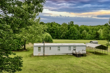 Small Acreage w/ Home and Private Lake for Sale near Paris, TN - image 3