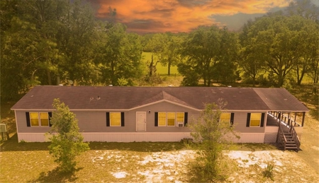 5 Acre Potential Mini Farm in Bell set on a sloped hill - image 32