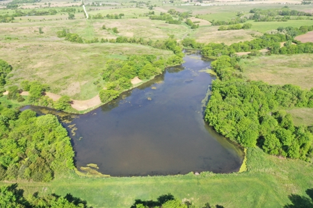 140 Acres m/l with CRP Income, Lake, and Prime Hunting - image 10