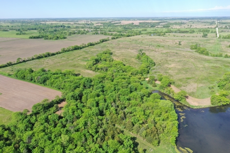 140 Acres m/l with CRP Income, Lake, and Prime Hunting - image 11
