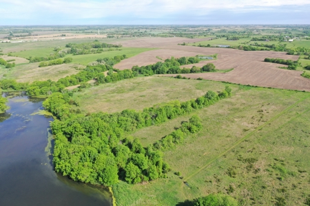 140 Acres m/l with CRP Income, Lake, and Prime Hunting - image 12