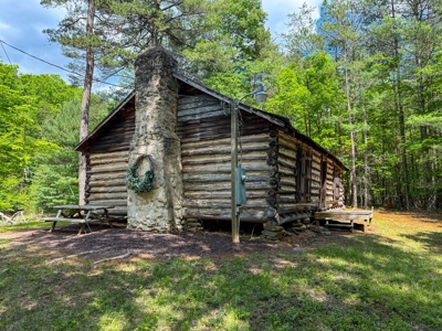 Secluded Log Cabin Paradise with 18 Acres of Natural Wonder - image 12