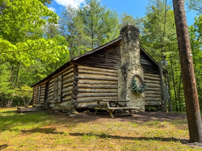Secluded Log Cabin Paradise with 18 Acres of Natural Wonder - image 13