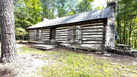 Secluded Log Cabin Paradise with 18 Acres of Natural Wonder - image 11