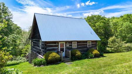 Turn-Key Mountain Getaway Cabin with Rental Income Potential - image 1