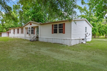 Investment Opportunity: North Florida Acreage & Fixer-Upper Home - image 1