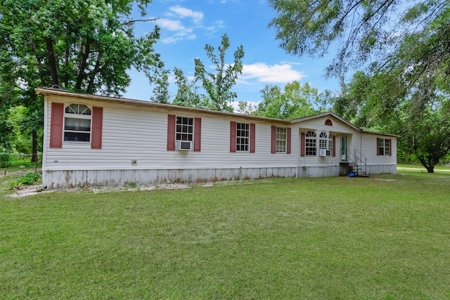 Investment Opportunity: North Florida Acreage & Fixer-Upper Home - image 6